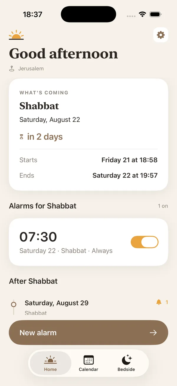 ShabbatRise home screen showing when Shabbat starts and ends in Jerusalem, with a Shabbat morning alarm switched on (app in English)